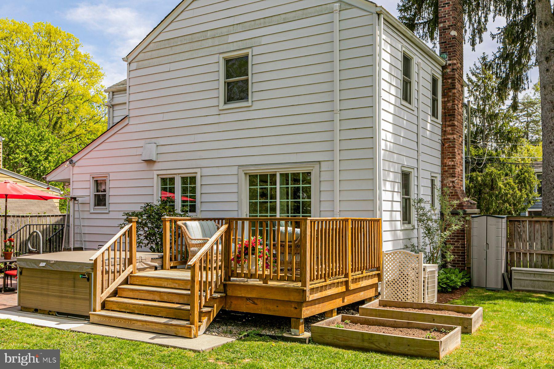44 Southern Way Princeton, NJ 08540 - Photo 25 of 35 a view of house with a yard and furniture