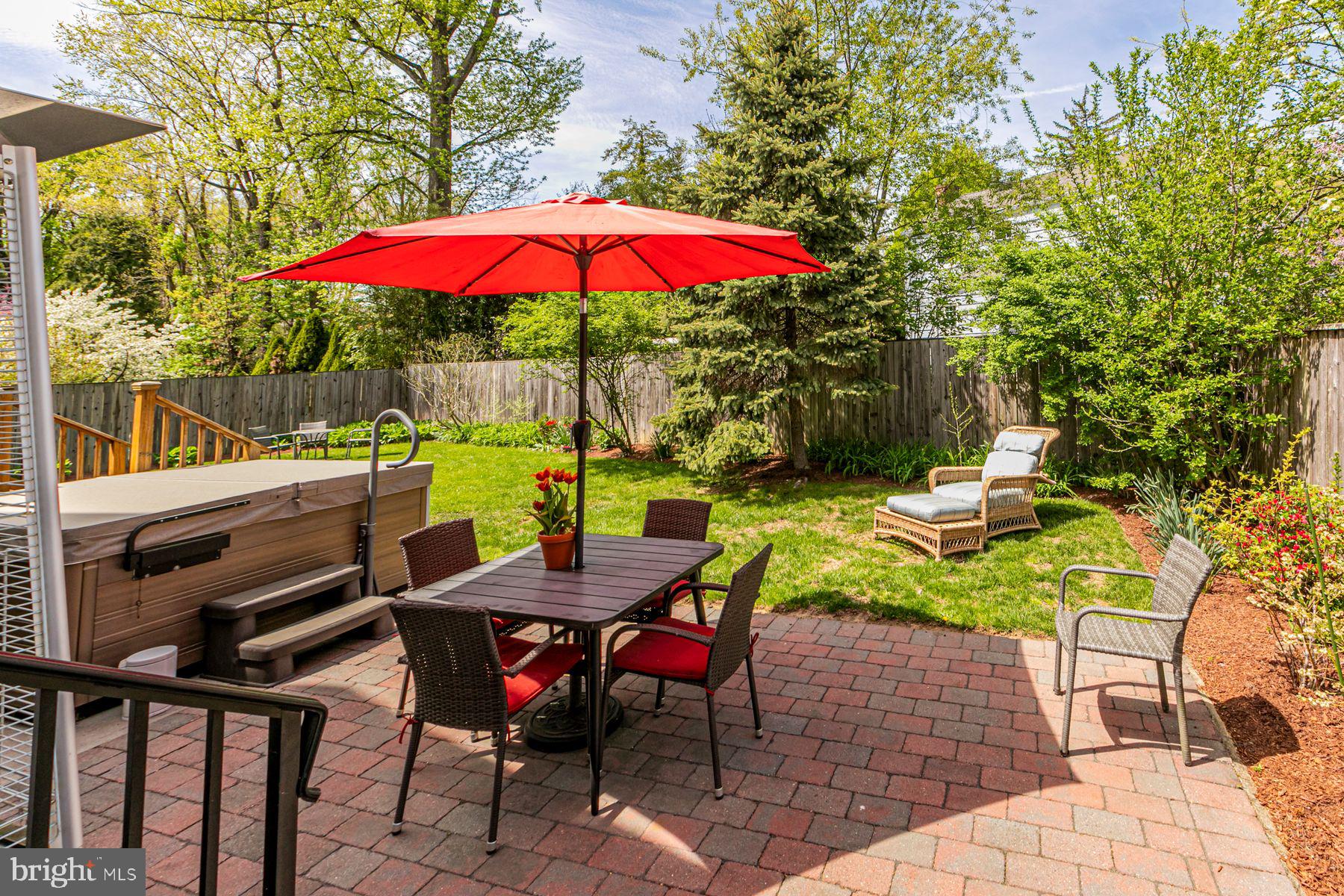 44 Southern Way Princeton, NJ 08540 - Photo 28 of 35 an outdoor space with furniture and umbrella