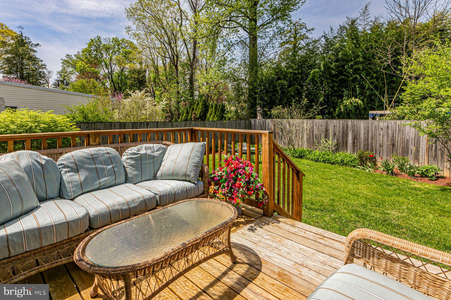 44 Southern Way Princeton, NJ 08540 - Photo 32 of 35 a roof deck with couches and wooden fence
