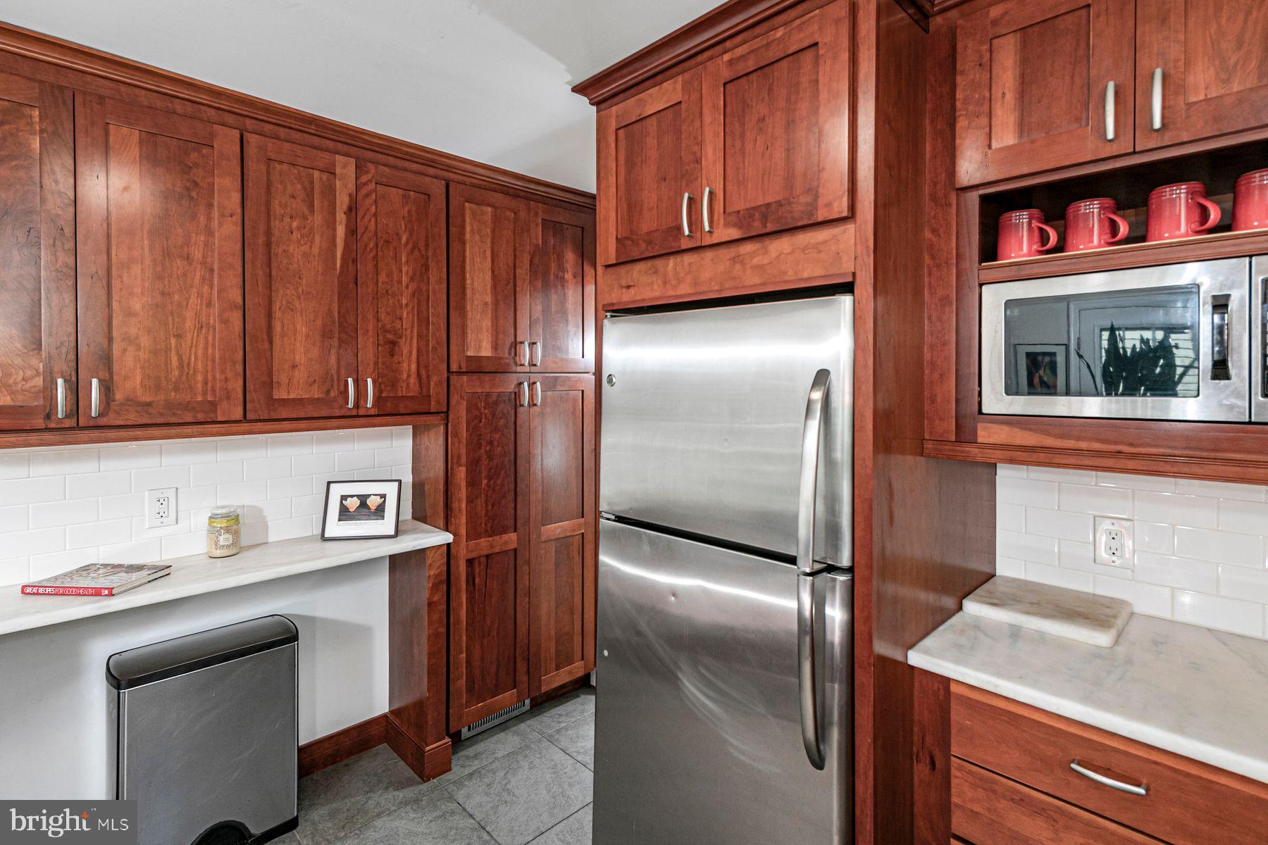 44 Southern Way Princeton, NJ 08540 - Photo 10 of 35 a kitchen with stainless steel appliances granite countertop a refrigerator and a sink