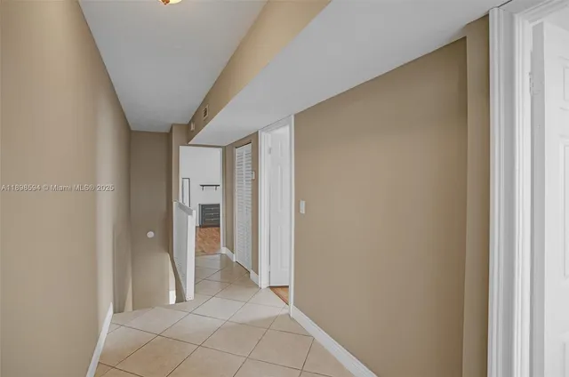 a view of entryway with bathroom