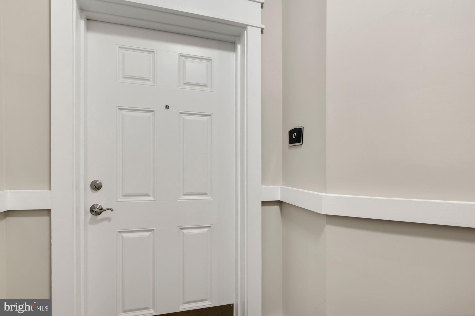 3825 Doc Berlin Drive, Unit 17 Silver Spring, MD 20906 - Photo 30 of 34 a view of a hallway