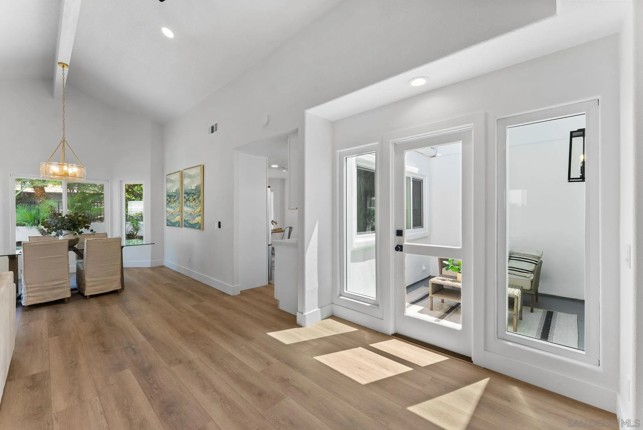 4714 Athos Way Oceanside, CA 92056 - Photo 11 of 34 a view of an empty room and kitchen with window
