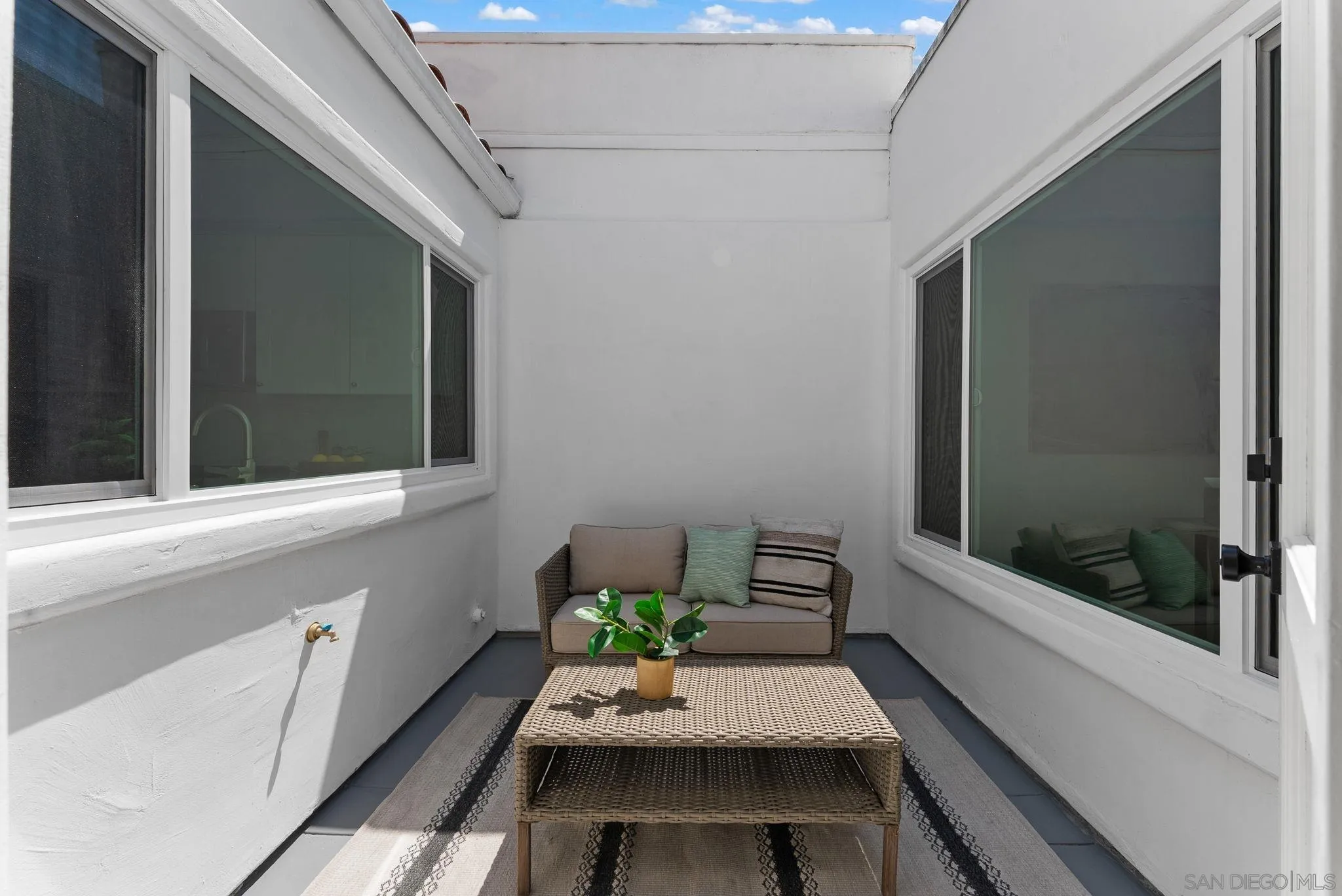 4714 Athos Way Oceanside, CA 92056 - Photo 12 of 34 a view of a balcony with furniture