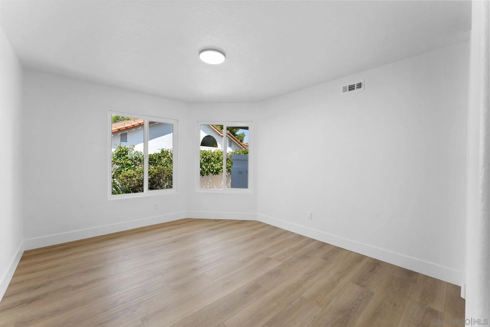 4714 Athos Way Oceanside, CA 92056 - Photo 20 of 34 wooden floor in an empty room