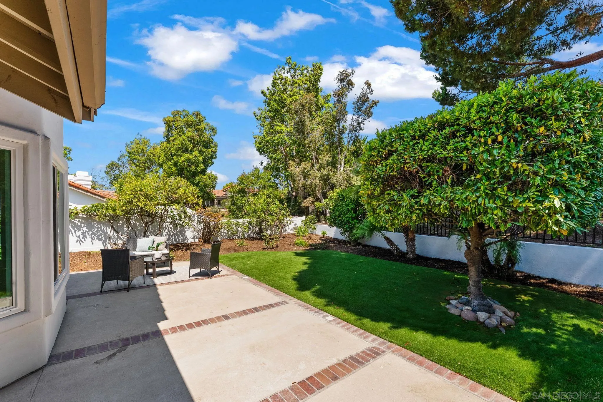 4714 Athos Way Oceanside, CA 92056 - Photo 29 of 34 a view of a backyard with sitting area
