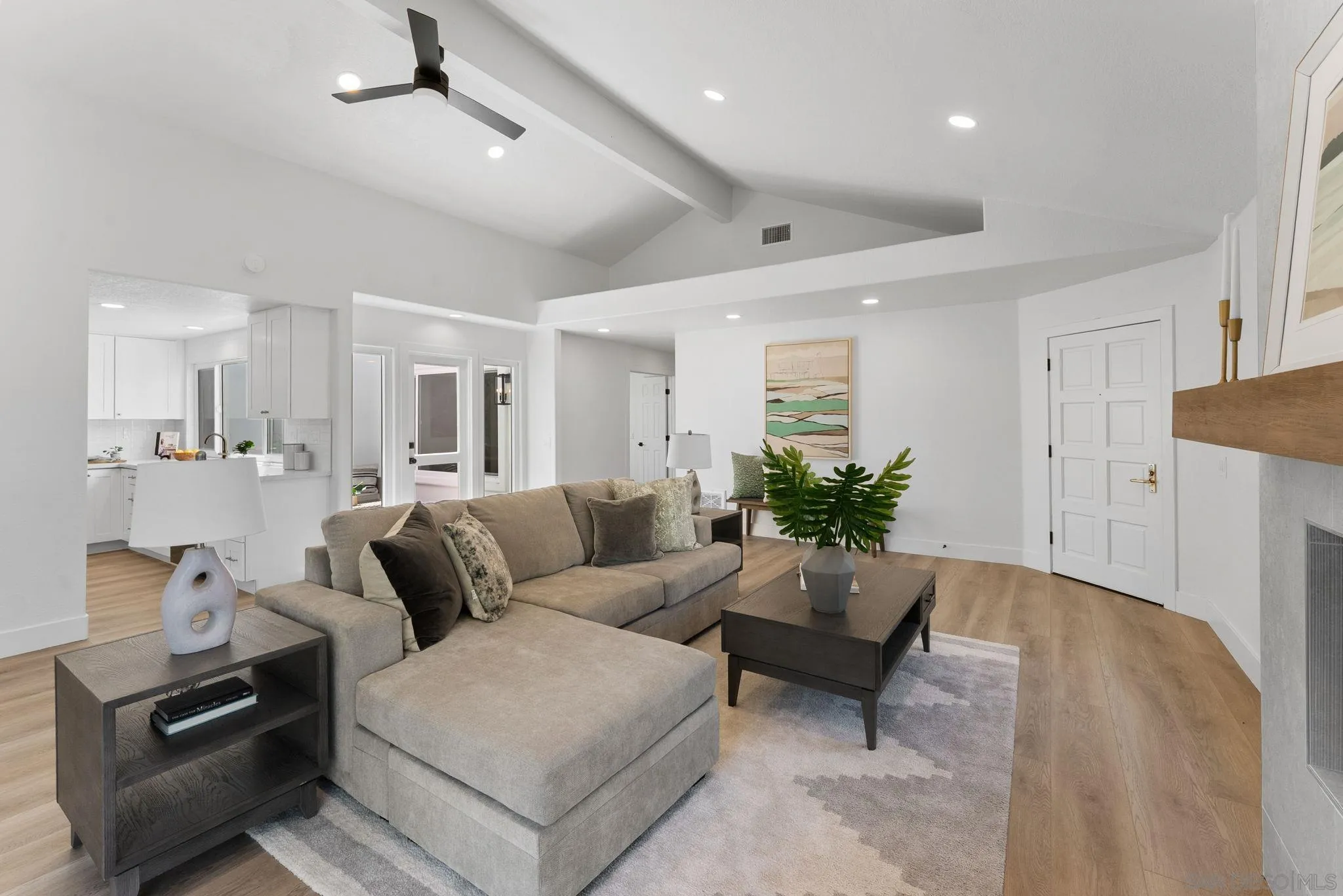 4714 Athos Way Oceanside, CA 92056 - Photo 9 of 34 a living room with furniture and wooden floor