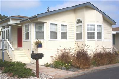 48 Yosemite Road, Unit 48 San Rafael, CA 94903 - Photo 1 of 8 a front view of a house with a yard