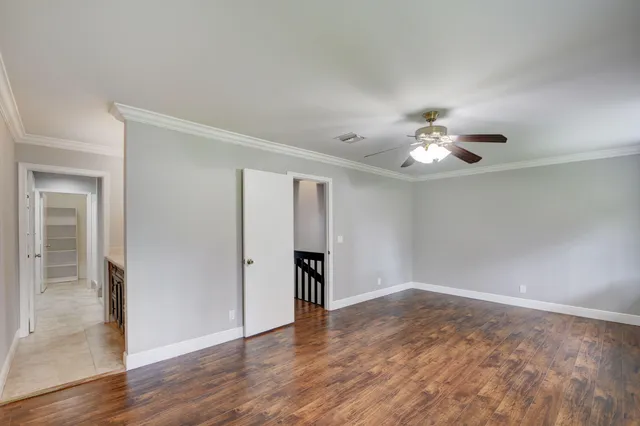 a view of an empty walk in closet