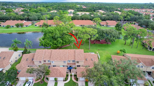 an aerial view of a house with a garden