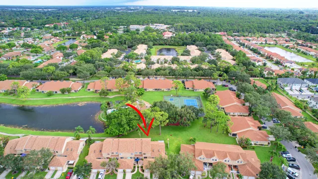 a view of a swimming pool with a yard