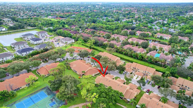 a view of swimming pool with chairs