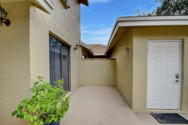 a kitchen with a sink and stainless steel appliances