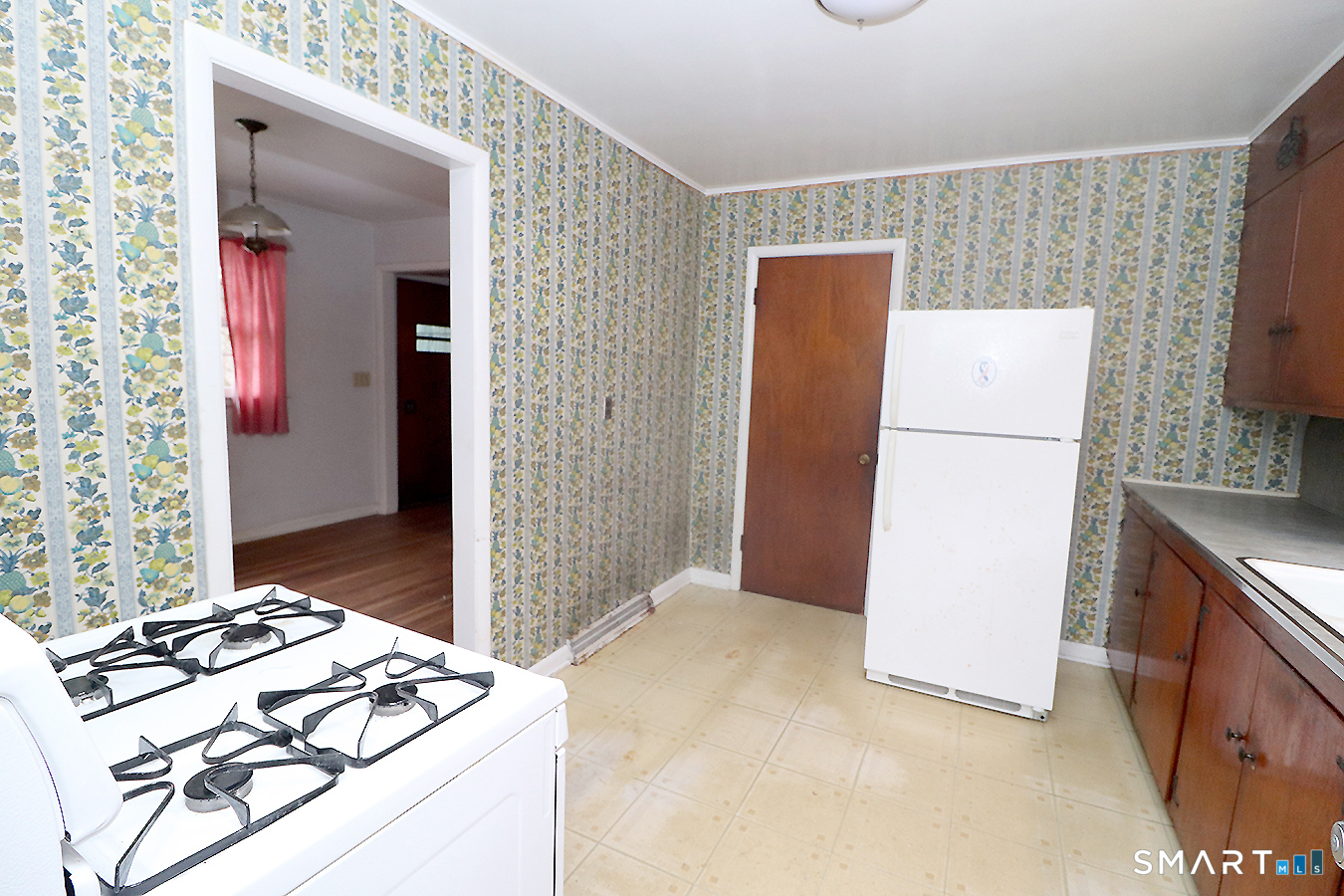 15 Connelly Road New Milford, CT 06776 - Photo 12 of 28 a kitchen with a refrigerator and a stove