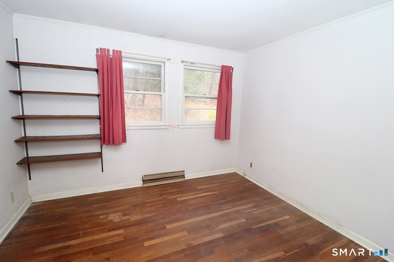 15 Connelly Road New Milford, CT 06776 - Photo 19 of 28 a view of empty room with wooden floor and fan