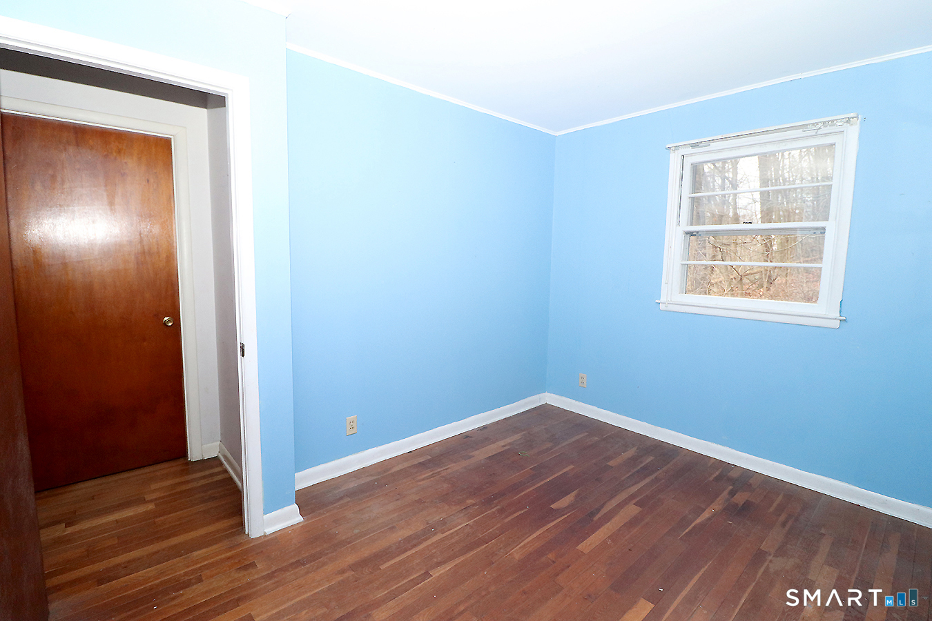 15 Connelly Road New Milford, CT 06776 - Photo 22 of 28 an empty room with wooden floor and windows