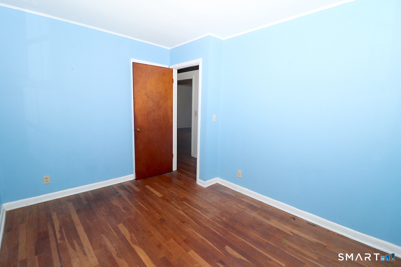 15 Connelly Road New Milford, CT 06776 - Photo 23 of 28 an empty room with wooden floor and closet