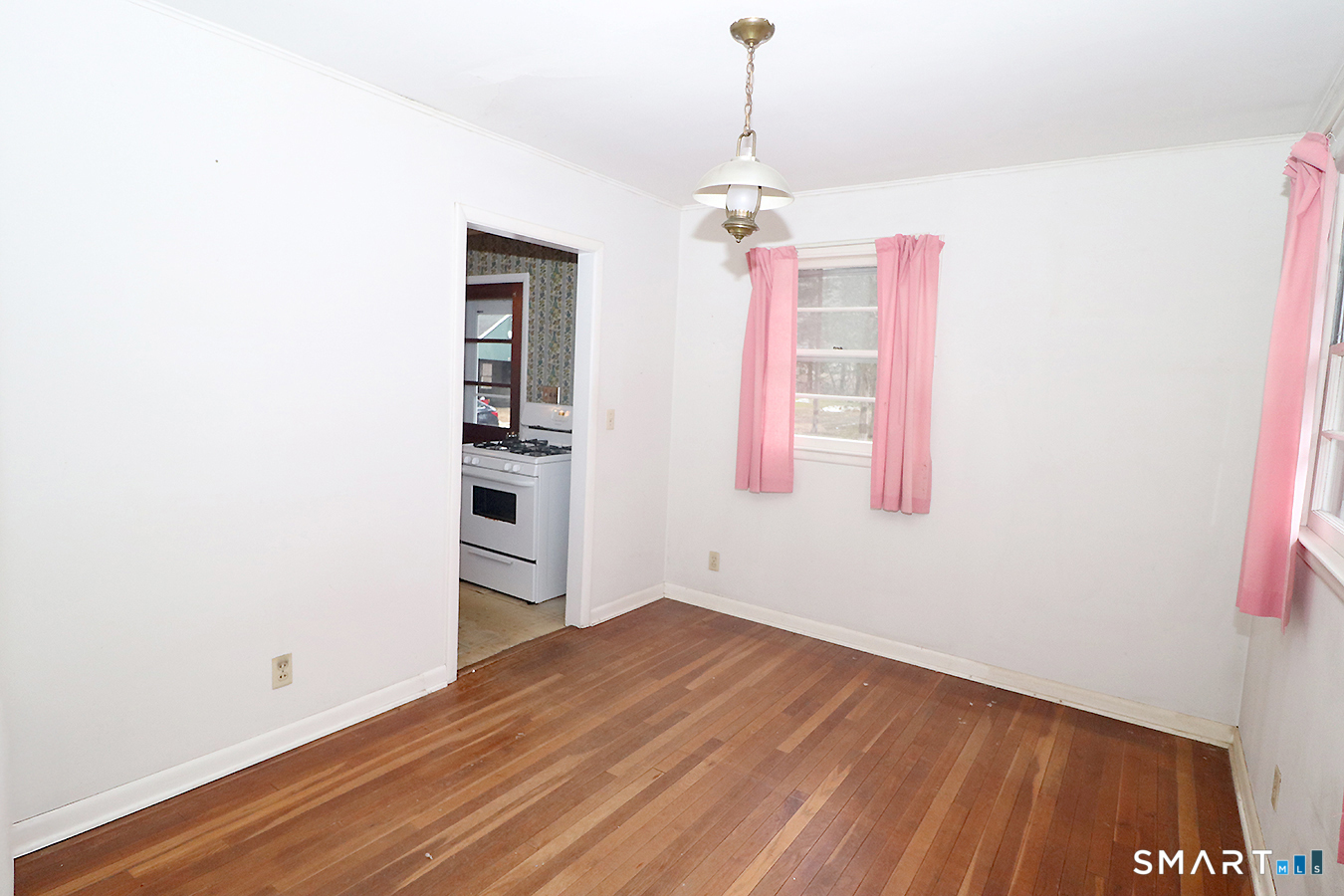 15 Connelly Road New Milford, CT 06776 - Photo 7 of 28 a view of empty room with wooden floor and window