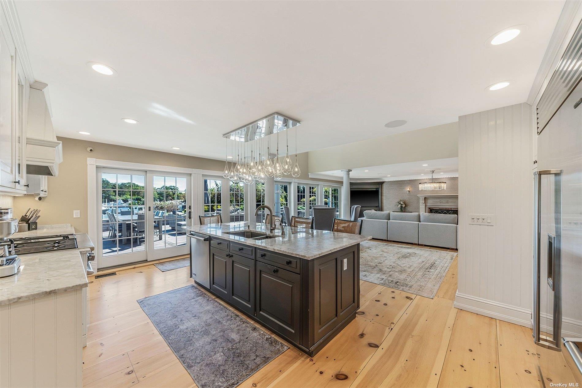 300 Maple Street Islip, NY 11751 - Photo 14 of 50 a living room with stainless steel appliances granite countertop furniture and a kitchen view