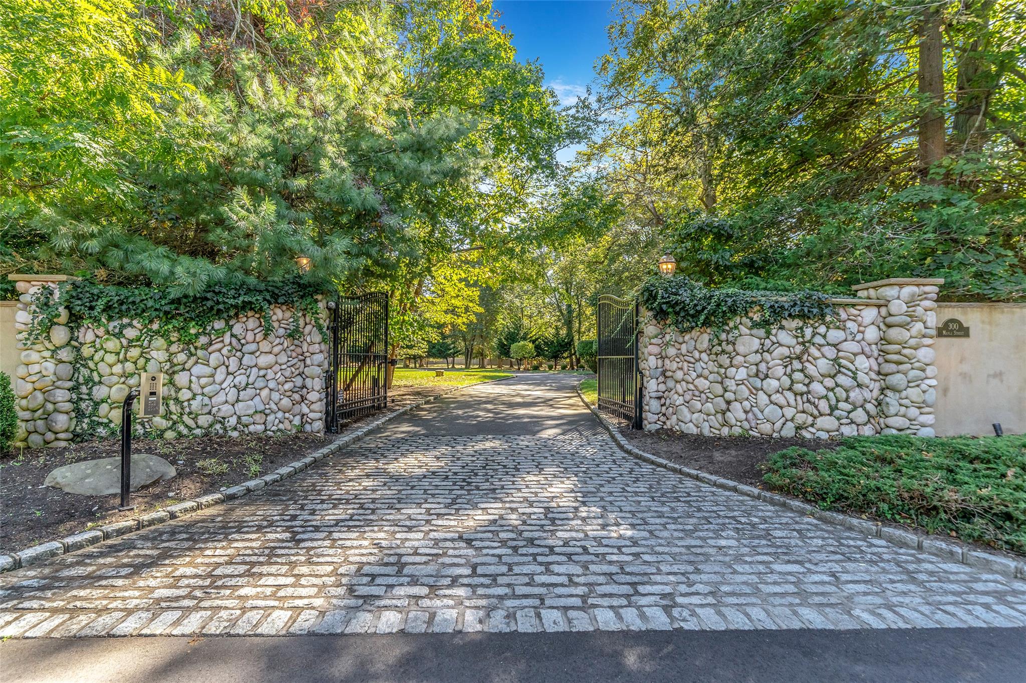 300 Maple Street Islip, NY 11751 - Photo 49 of 50 a view of a yard with plants and trees