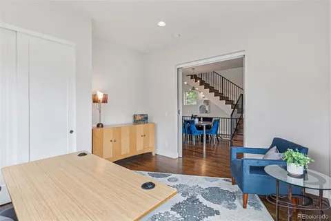 a living room with furniture and a table