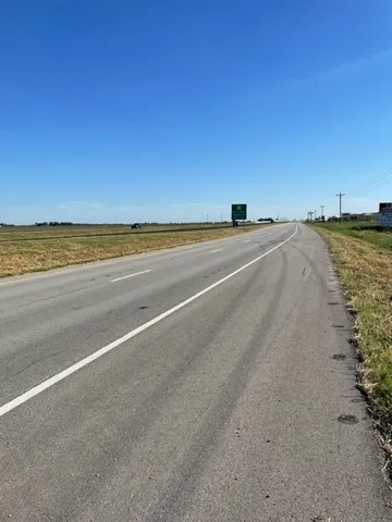 a view of ocean and a mountain