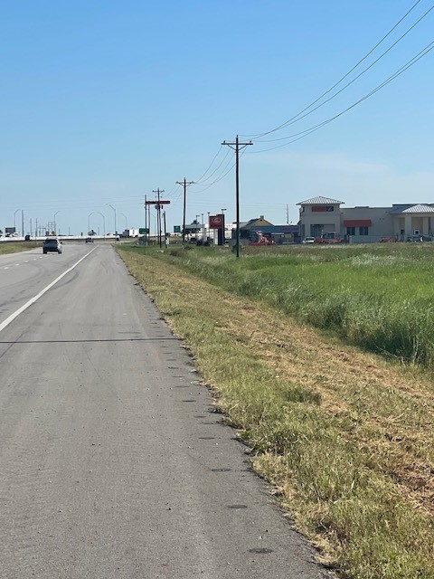 1408 North Blue Creek Road El Campo, TX 77437 - Photo 9 of 10 a view of a terrace with yard