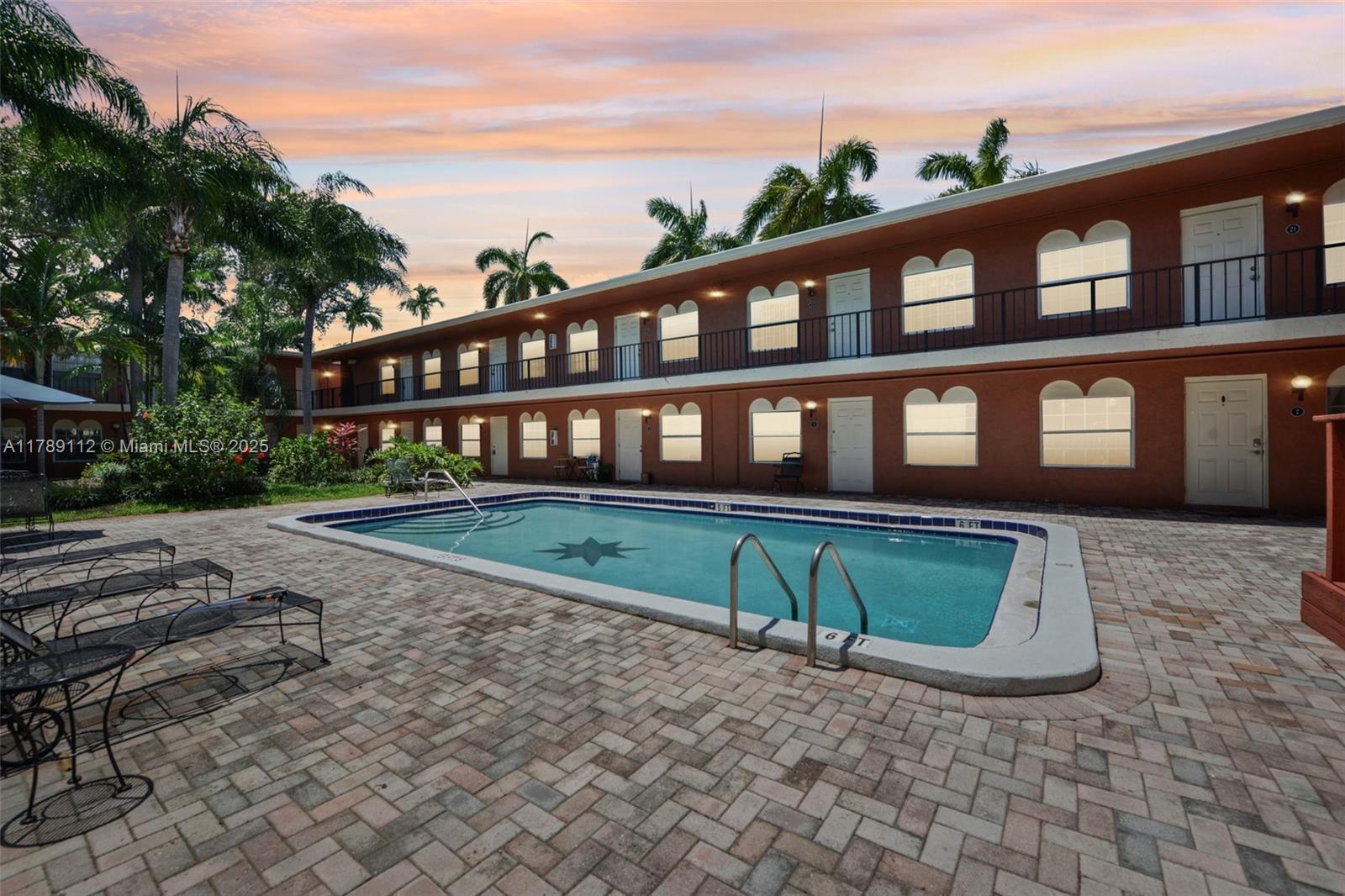1405 Miami Road, Unit 5 Fort Lauderdale, FL 33316 - Photo 1 of 38 a front view of a house with a yard