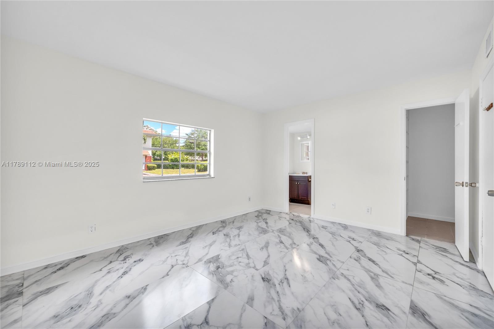 1405 Miami Road, Unit 5 Fort Lauderdale, FL 33316 - Photo 14 of 38 a view of empty room with wooden floor