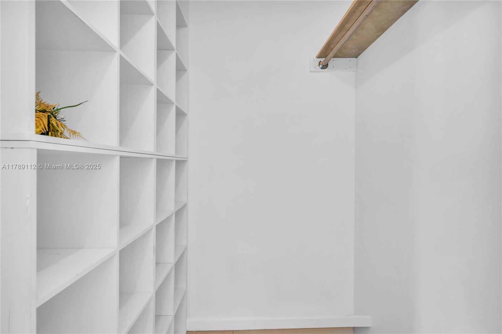 1405 Miami Road, Unit 5 Fort Lauderdale, FL 33316 - Photo 15 of 38 a view of staircase with white walls and window