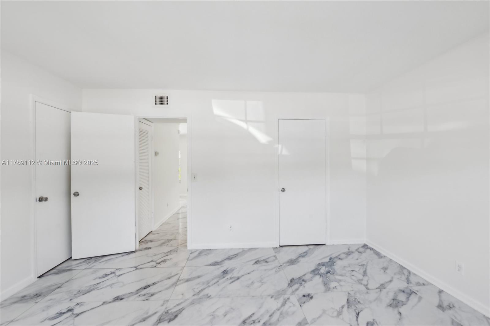 1405 Miami Road, Unit 5 Fort Lauderdale, FL 33316 - Photo 17 of 38 a view of an empty room