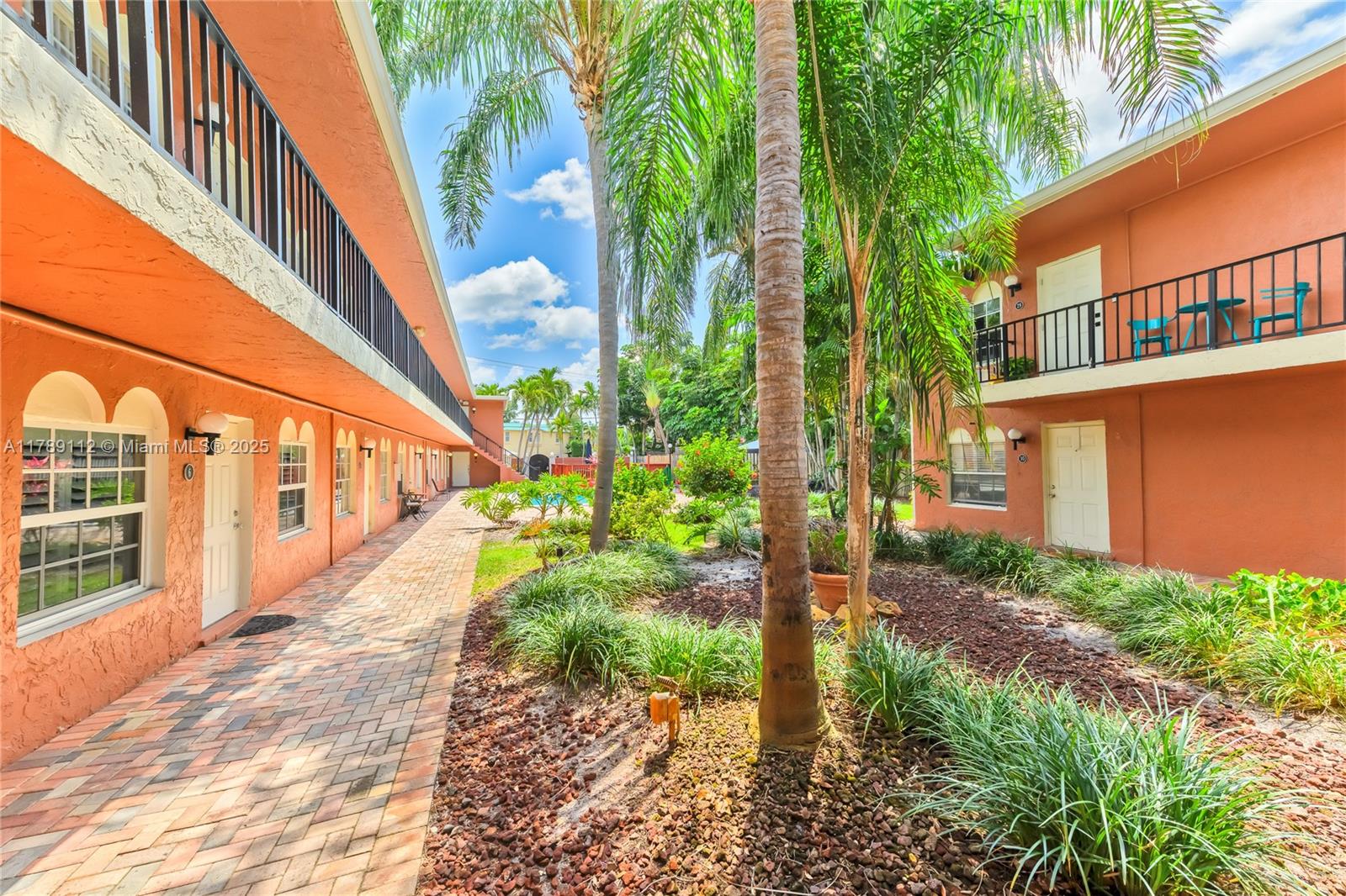 1405 Miami Road, Unit 5 Fort Lauderdale, FL 33316 - Photo 22 of 38 a view of a pathway with a yard