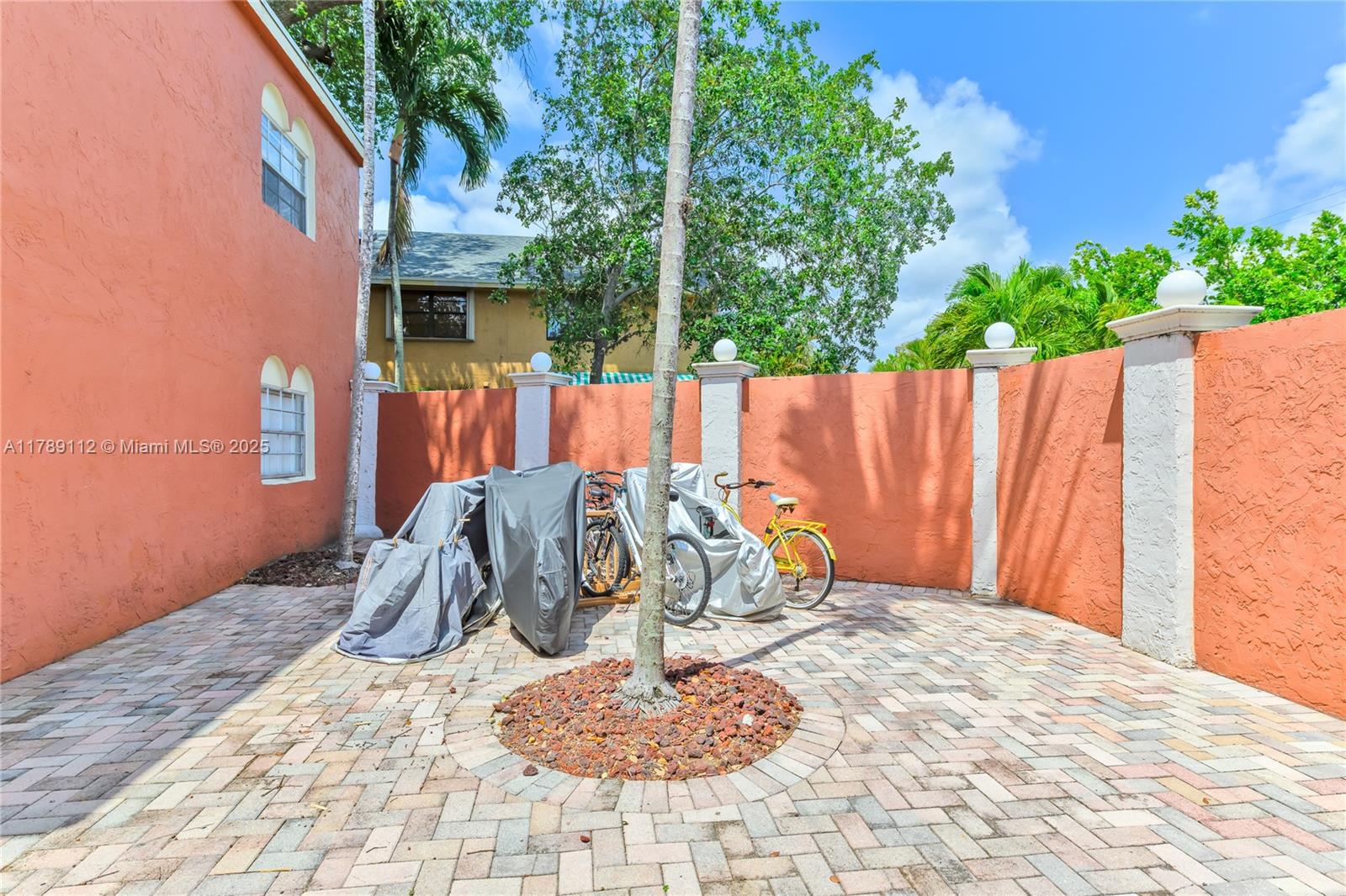 1405 Miami Road, Unit 5 Fort Lauderdale, FL 33316 - Photo 23 of 38 a view of a backyard of the house