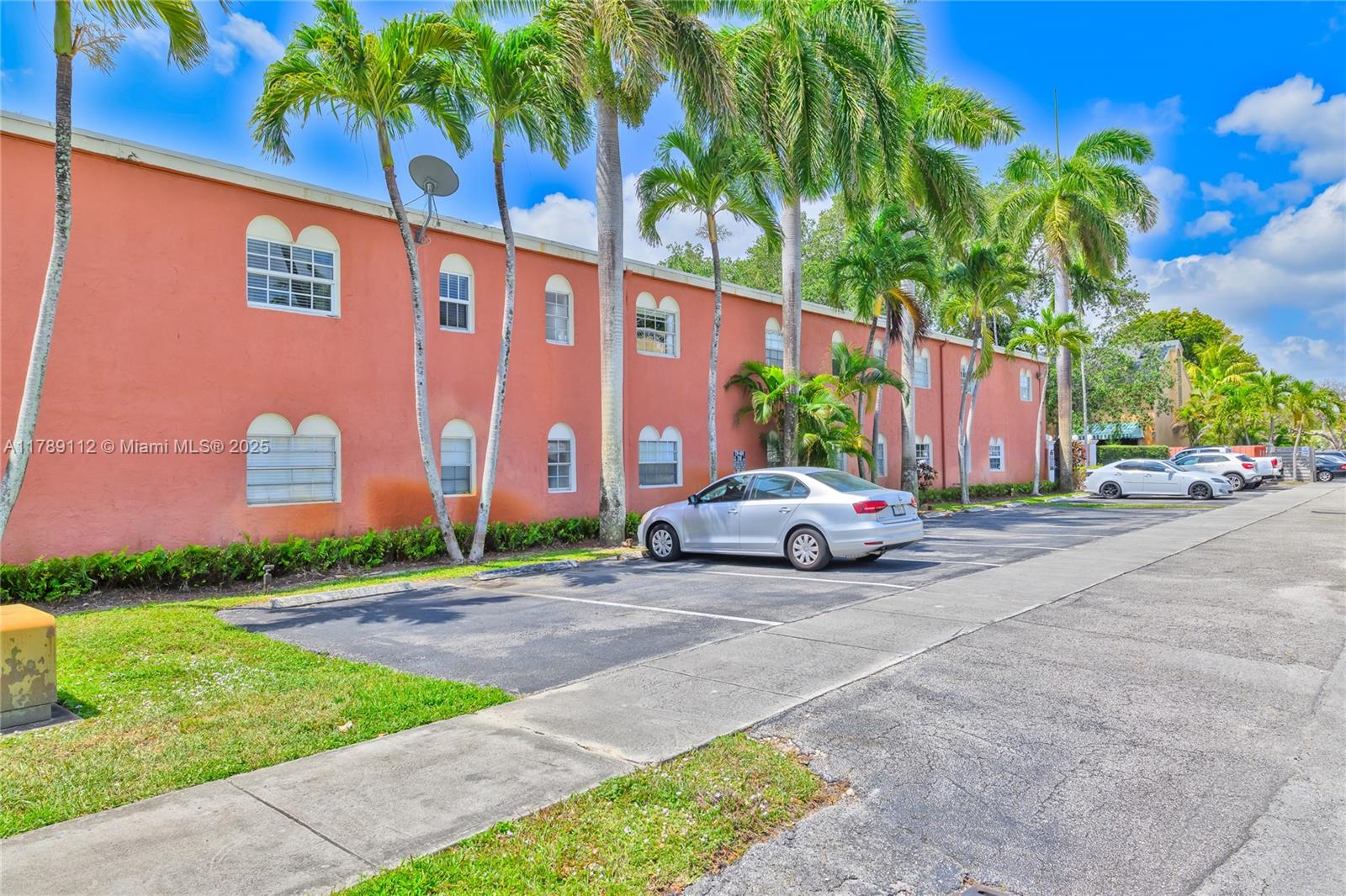 1405 Miami Road, Unit 5 Fort Lauderdale, FL 33316 - Photo 30 of 38 a view of a street with a cars parked in front of it
