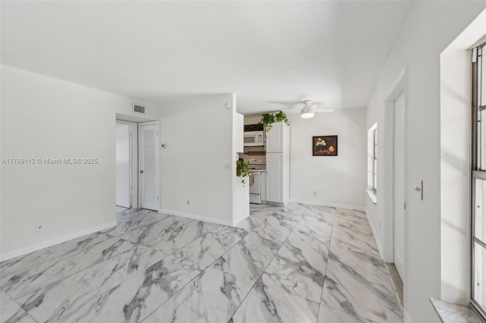 1405 Miami Road, Unit 5 Fort Lauderdale, FL 33316 - Photo 10 of 38 a view of an empty room