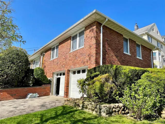 a front view of house with yard