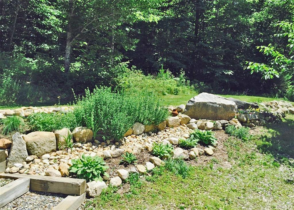 46 Chaplins Mill Road Naples, ME 04055 - Photo 7 of 22 Back Yard Herb garden.