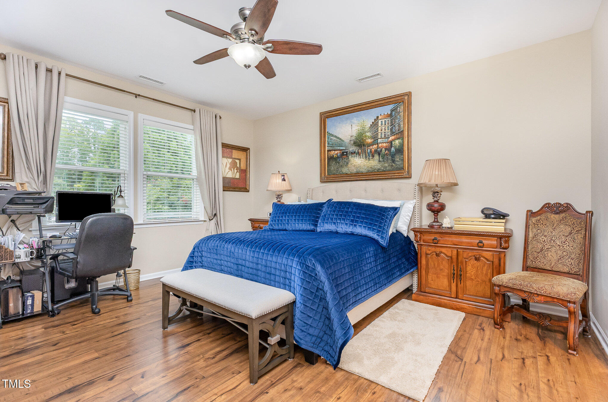 1205 Barnford Mill Road Wake Forest, NC 27587 - Photo 10 of 17 a bedroom with a bed and wooden floor