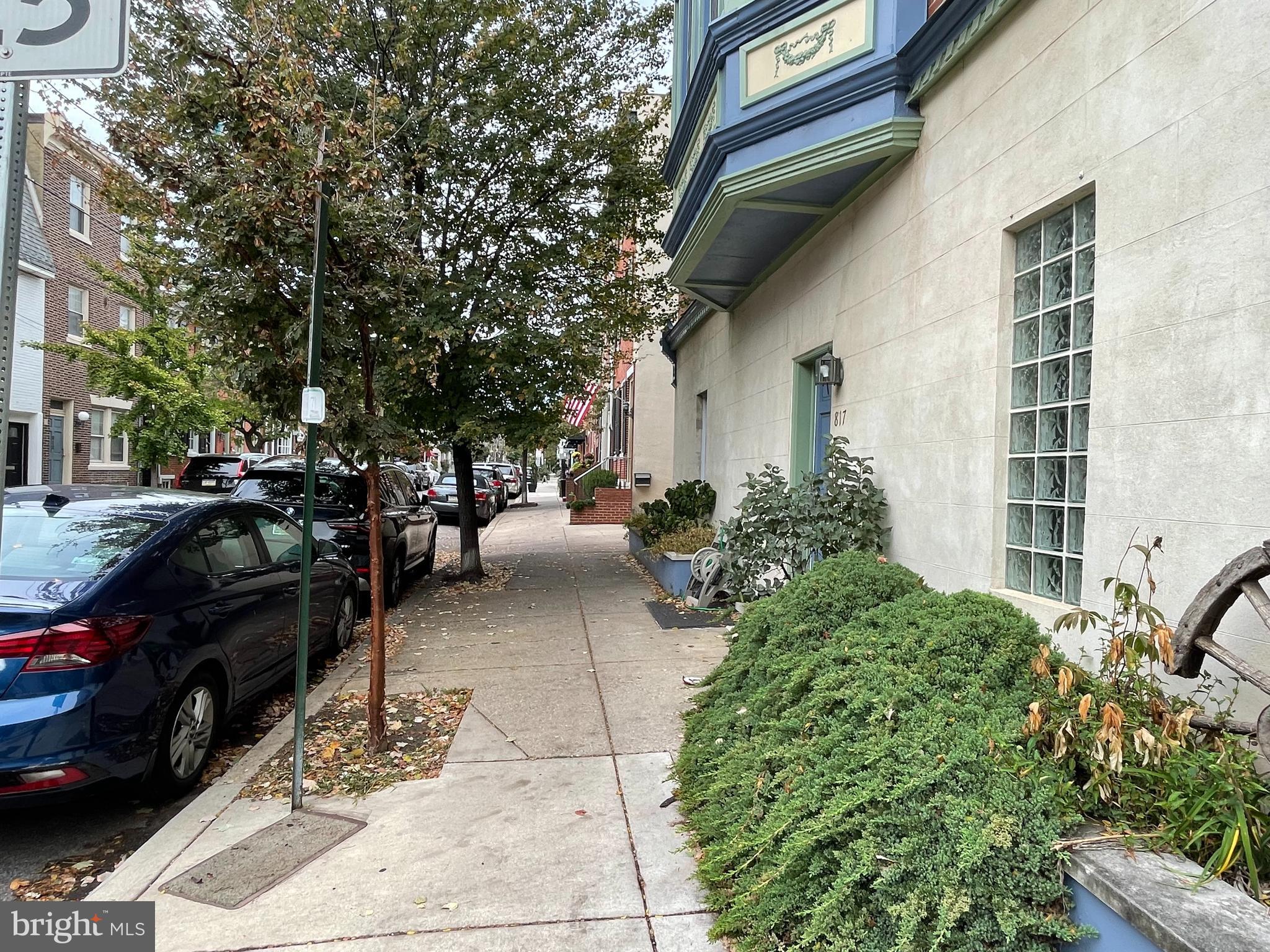 261 Queen Street, Unit 1 Philadelphia, PA 19147 - Photo 2 of 14 a view of a patio with table and chairs and potted plants