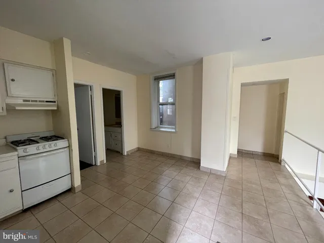 a view of a kitchen with storage and utility