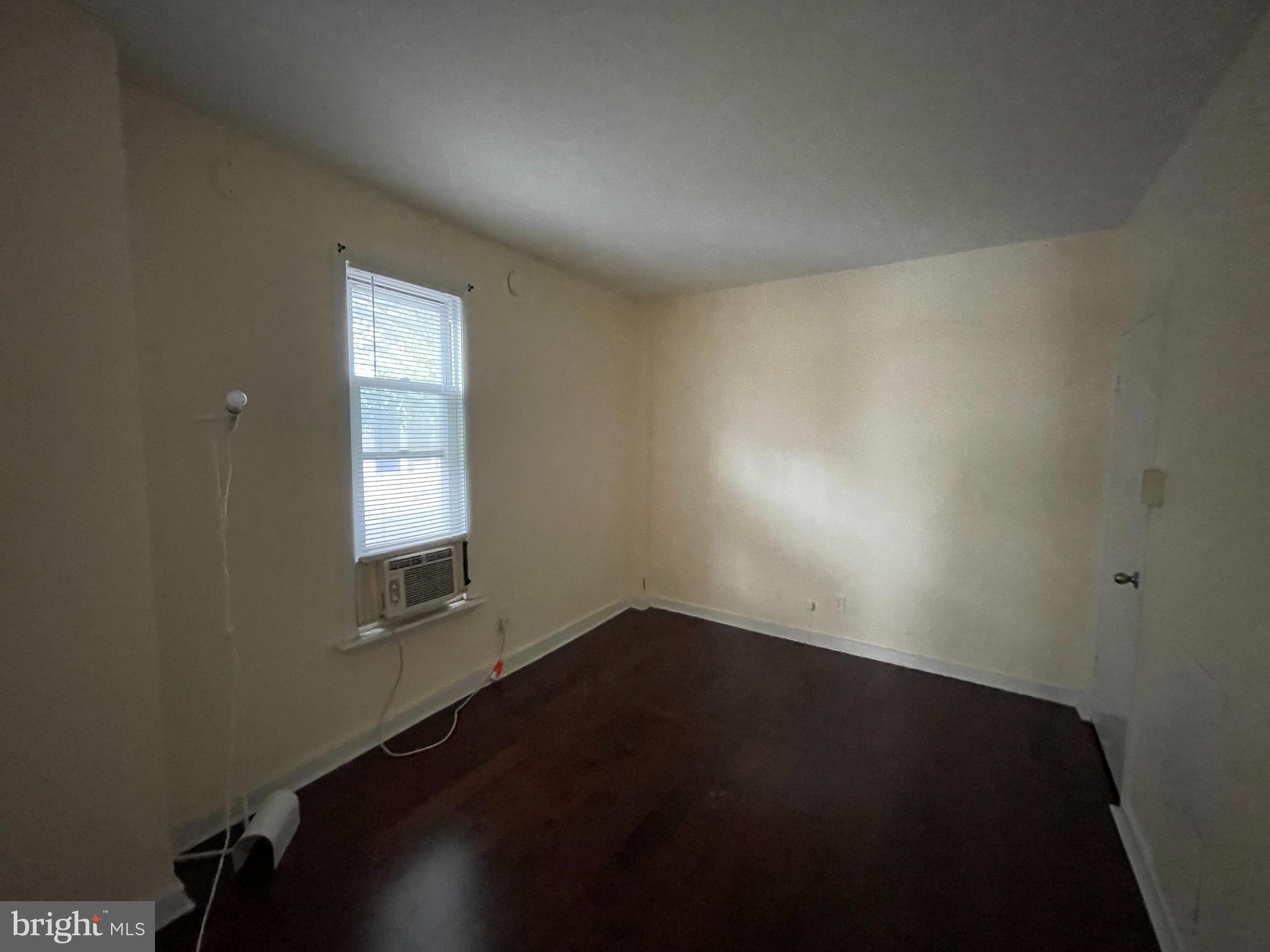 261 Queen Street, Unit 1 Philadelphia, PA 19147 - Photo 6 of 14 an empty room with windows