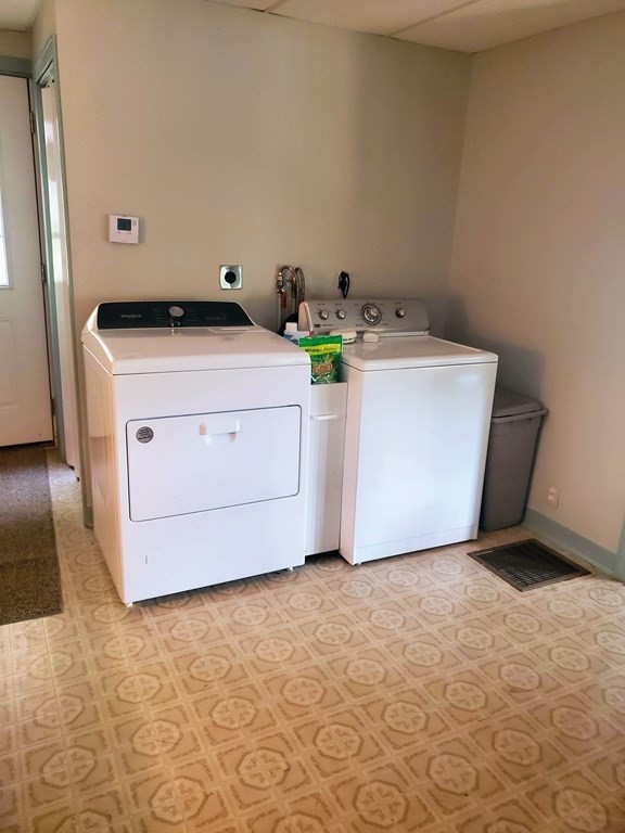 154 Lake Road Sturbridge, MA 01518 - Photo 12 of 39 a utility room with a washer and dryer