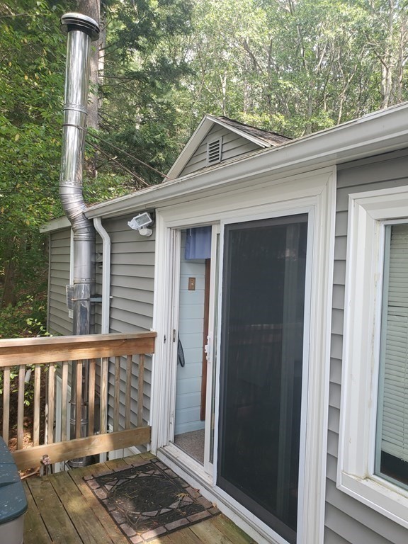 154 Lake Road Sturbridge, MA 01518 - Photo 13 of 39 a front view of a house with a garden