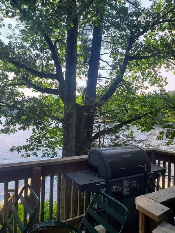 154 Lake Road Sturbridge, MA 01518 - Photo 16 of 39 a view of a balcony with chairs