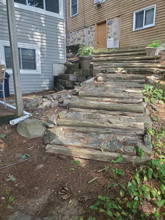 154 Lake Road Sturbridge, MA 01518 - Photo 27 of 39 a view of a house with a yard