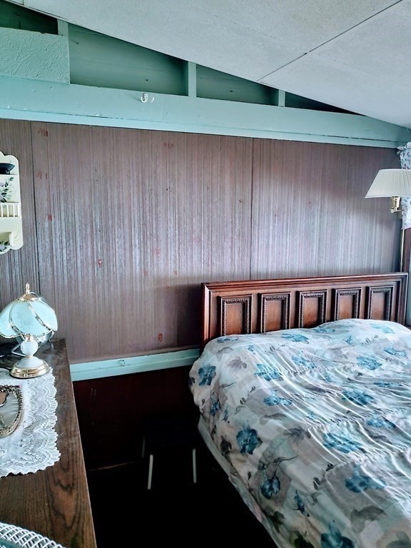 154 Lake Road Sturbridge, MA 01518 - Photo 9 of 39 a bedroom with a bed and a dresser