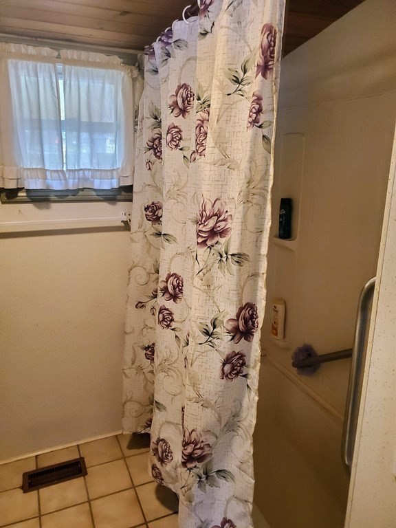 154 Lake Road Sturbridge, MA 01518 - Photo 10 of 39 a bathroom with a shower