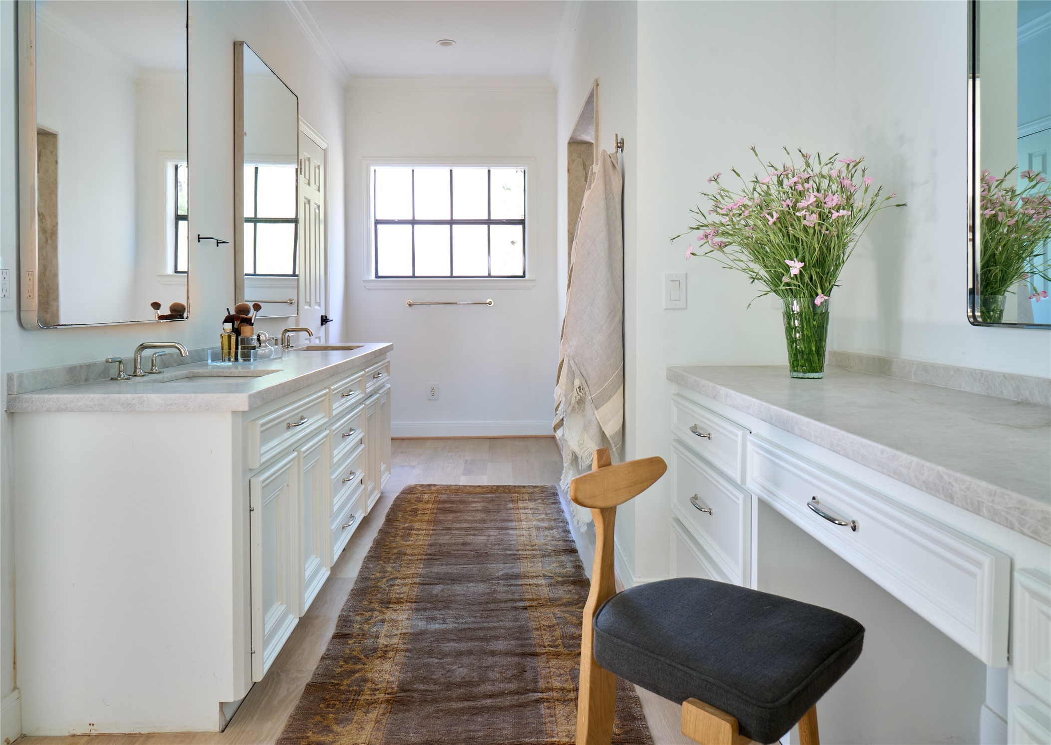 3020 Duke Street Houston, TX 77005 - Photo 16 of 23 Luxurious primary bath with dual vanities and spa-inspired design