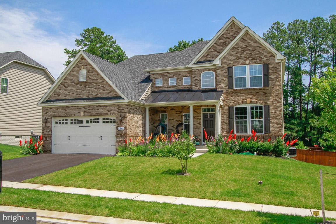 10502 Windlass Run Road Baltimore, MD 21220 - Photo 2 of 26 a view of a house with garden and yard