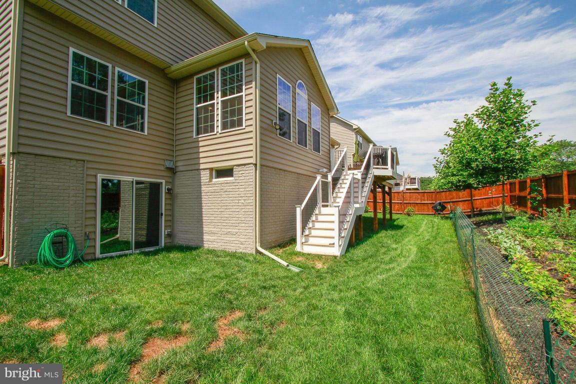 10502 Windlass Run Road Baltimore, MD 21220 - Photo 3 of 26 a view of a house with backyard